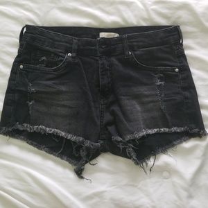 Black distressed jean shorts